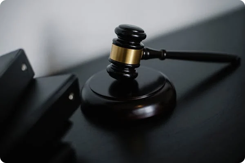 Gavel representing regulatory filing
